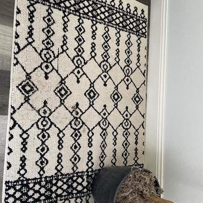 Faux olive tree with rug