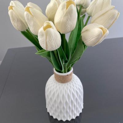 Black candlesticks with small floral decor