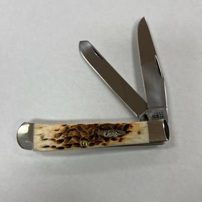 Case XX Amber Bone Peach Seed Jig Trapper