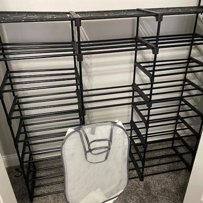 Closet storage rack with collapsible laundry