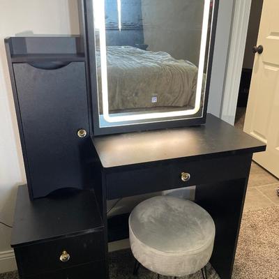 Lighted mirror Black vanity with small chair