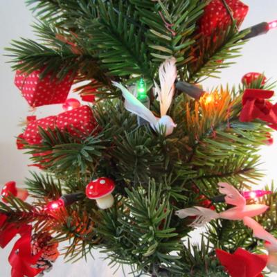 Lighted table-top Christmas tree, decorated
