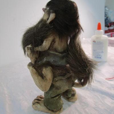 Dad & son troll piggy back ride