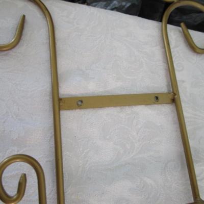 Gold-tone decorative plate hanger - holds 4 plates