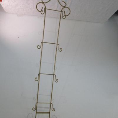Gold-tone decorative plate hanger - holds 4 plates