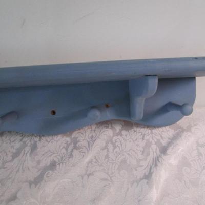 Blue wood coat rack