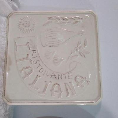 2 trivets, 1 decorative plate, 1 ceramic wall plaque