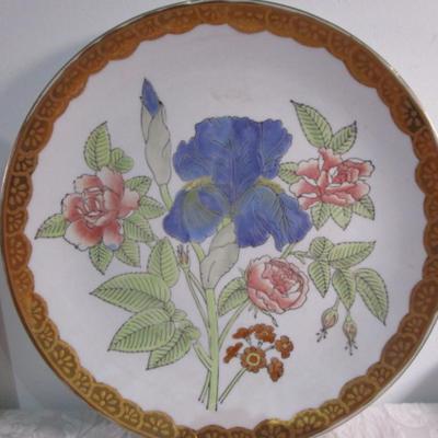 2 trivets, 1 decorative plate, 1 ceramic wall plaque