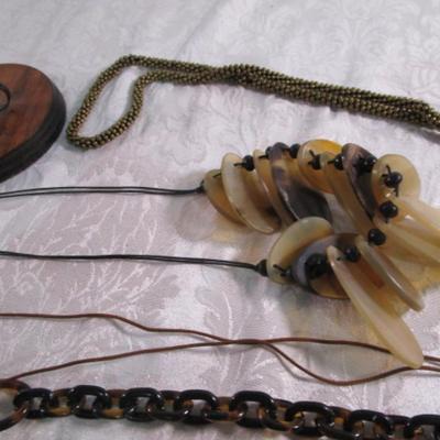 9 necklaces & a necklace tree