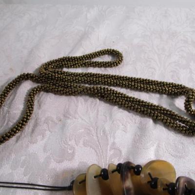 9 necklaces & a necklace tree