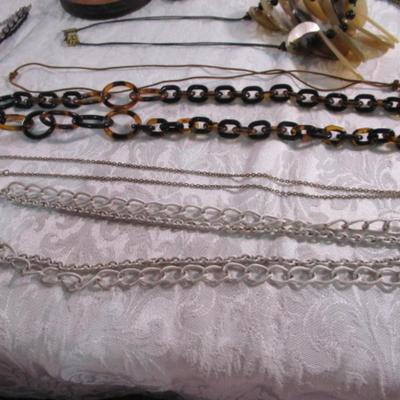 9 necklaces & a necklace tree