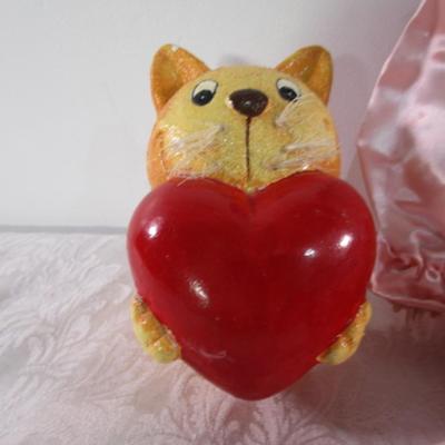 Porcelain clown, stuffed animals, hearts & swan, Eskimo doll