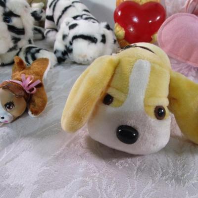 Porcelain clown, stuffed animals, hearts & swan, Eskimo doll