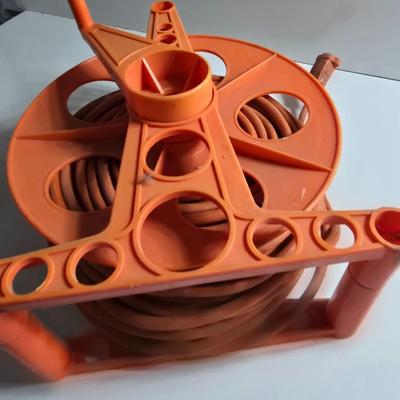 Orange Extension Cord Reel – Hand Crank with Built-In Cord