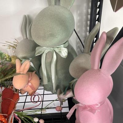 Large rabbit decor with some carrots and flowers