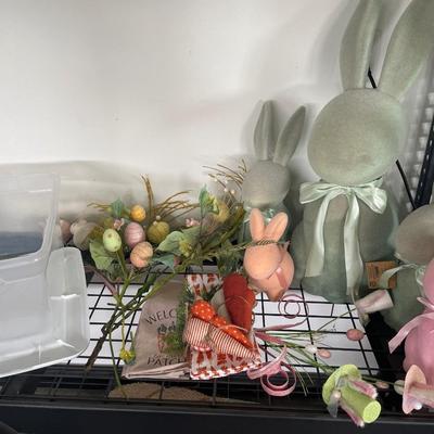 Large rabbit decor with some carrots and flowers