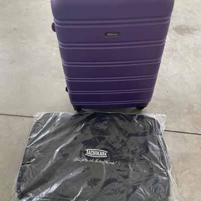 Purple suitcase and new Tachikara bag