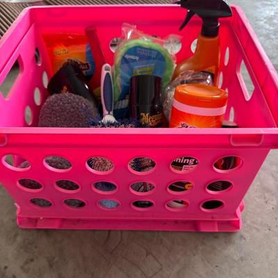 Car washing and cleaning supplies with pink crate