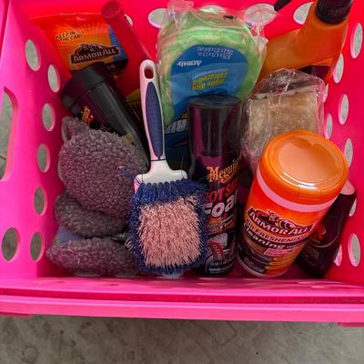 Car washing and cleaning supplies with pink crate