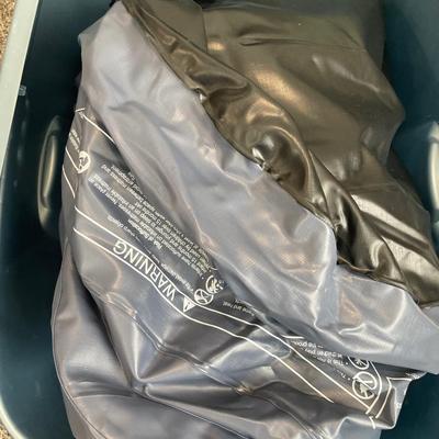 Air mattress in blue tote