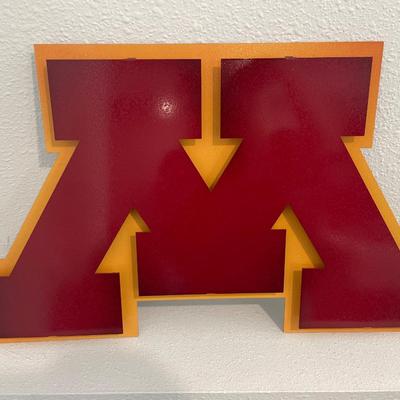 U of M logo metal sign