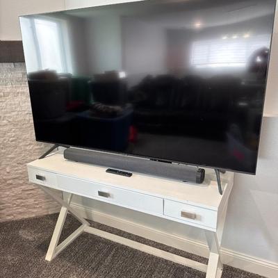 65” Samsung smart tv with TopVision sound bar and stand.