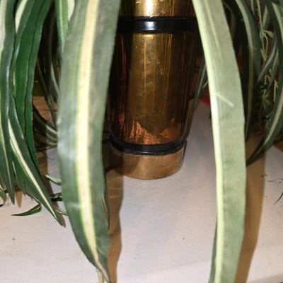 Faux spider plant in brass vase