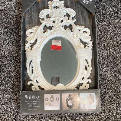 Wall mirror with white frame