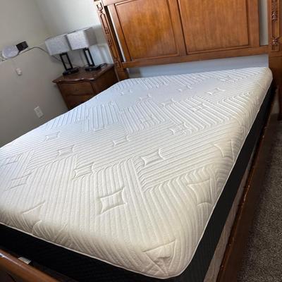 Sale Photo Thumbnail #725: The frame will need some work done to help the box spring lay flat. Currently, the mattress is tilting.