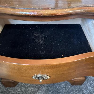 Small curved wood night stand