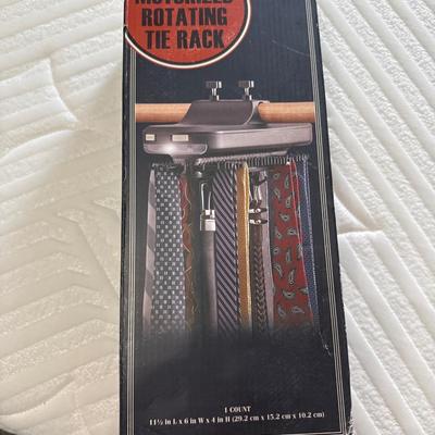 Motorized rotating tie rack made by Buxton