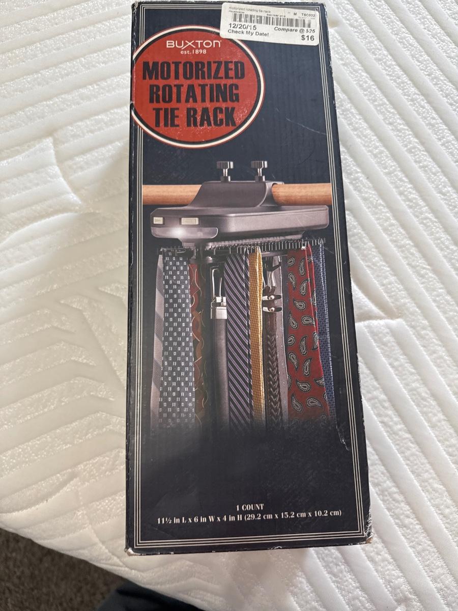 Motorized rotating tie rack made by Buxton | EstateSales.org