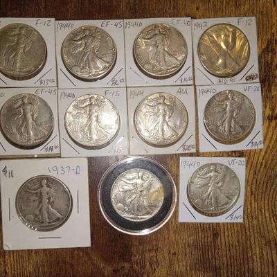 11 walking liberty 1/2 dollars