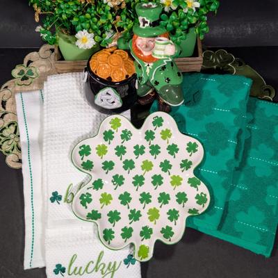 LOT 6B: Large Assortment Of St. Patrick's Day Home Decor, Kitchen Towels, Melamine Shamrock Plate, Ceramic Leprechaun Tea Light...