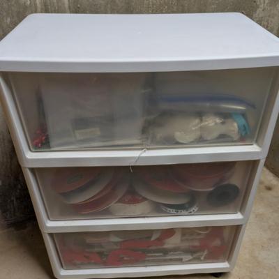 LOT 13B: 3 Drawer Plastic Storage Container On Wheels Containing Ribbons, Bows, Holiday Tags, Gift Bags & More Along With A Plastic...