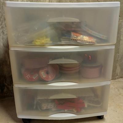 LOT 13B: 3 Drawer Plastic Storage Container On Wheels Containing Ribbons, Bows, Holiday Tags, Gift Bags & More Along With A Plastic...