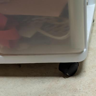LOT 13B: 3 Drawer Plastic Storage Container On Wheels Containing Ribbons, Bows, Holiday Tags, Gift Bags & More Along With A Plastic...