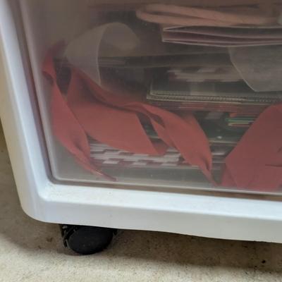 LOT 13B: 3 Drawer Plastic Storage Container On Wheels Containing Ribbons, Bows, Holiday Tags, Gift Bags & More Along With A Plastic...