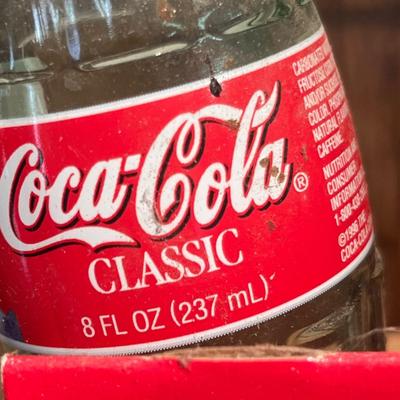 Lot 9 Vintage Broncos Coke Bottles in case