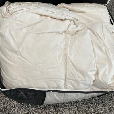 Storage bags with down comforter and drapes