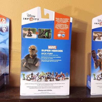 4 DISNEY INFINITY MARVEL SUPER HEROES IN SEALED PACKAGES
