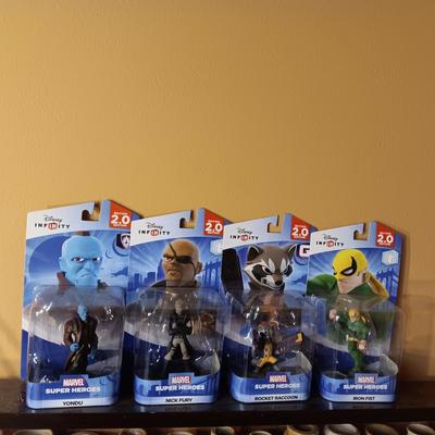 4 DISNEY INFINITY MARVEL SUPER HEROES IN SEALED PACKAGES