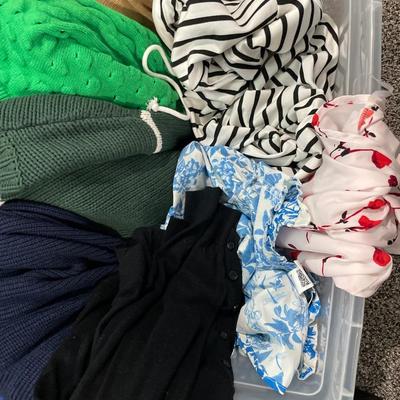 Tote of ladies sweaters, sweatshirts and dress shirts