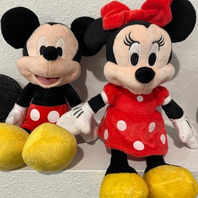 Minnie and Mickey with visors
