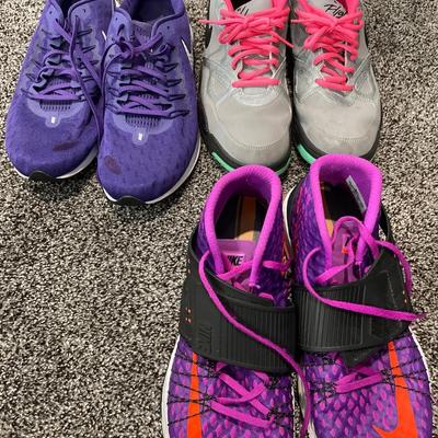 Men’s pink and purple Nike shoes
