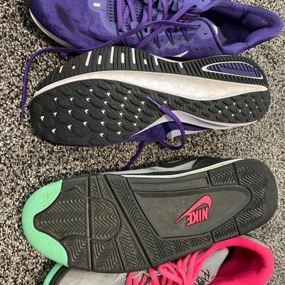 Men’s pink and purple Nike shoes