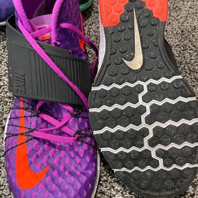 Men’s pink and purple Nike shoes