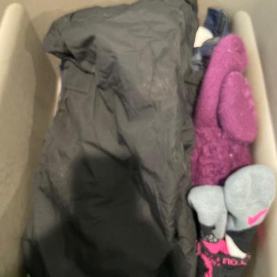 Tote of snowpants and Columbia jacket