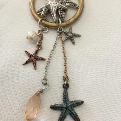 Super cute, gold and silver toned wish upon a star fish charm necklace