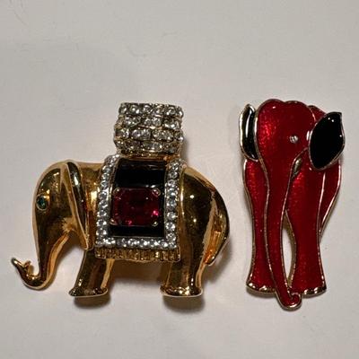 Two elephant brooches